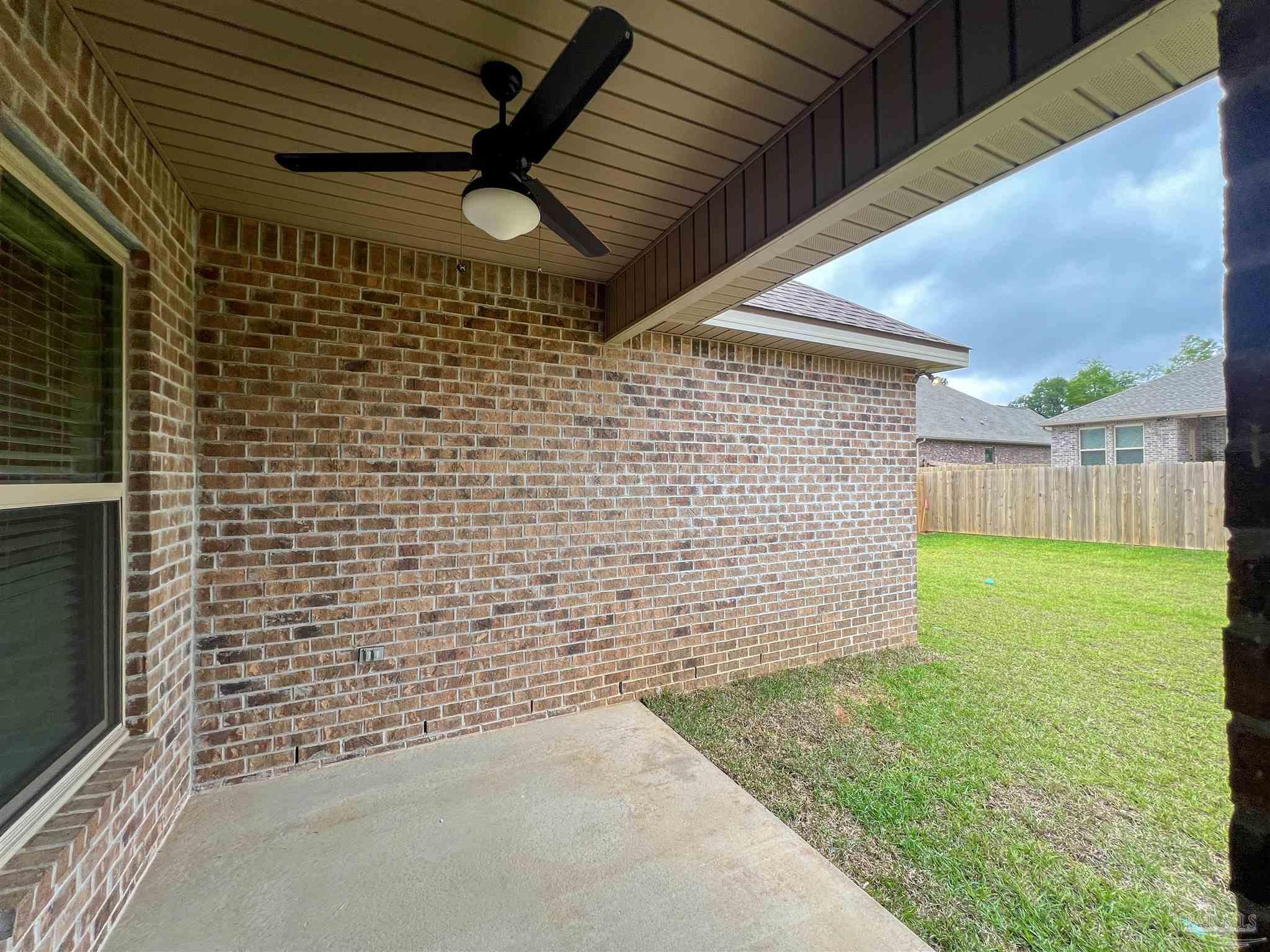 4605 Sago Palm Circle Milton, FL 32571 - Photo 32 of 33 a view of a backyard