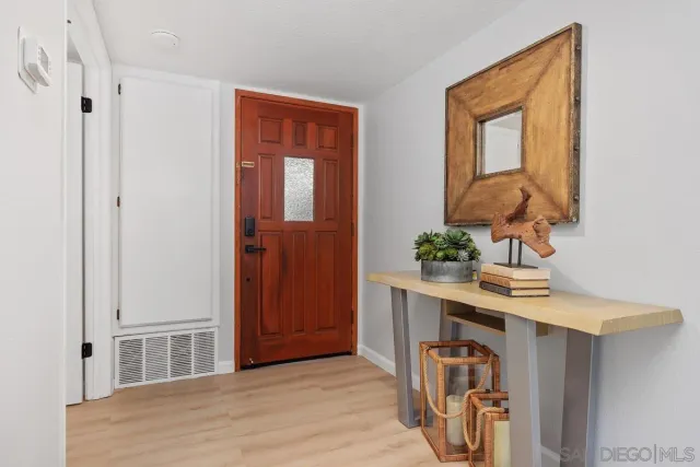 a view of livingroom with furniture and wooden floor