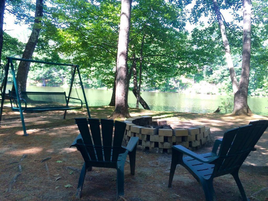 122 Unity Road Benton, ME 04901 - Photo 9 of 31 Fire pit overlooking total Maine...