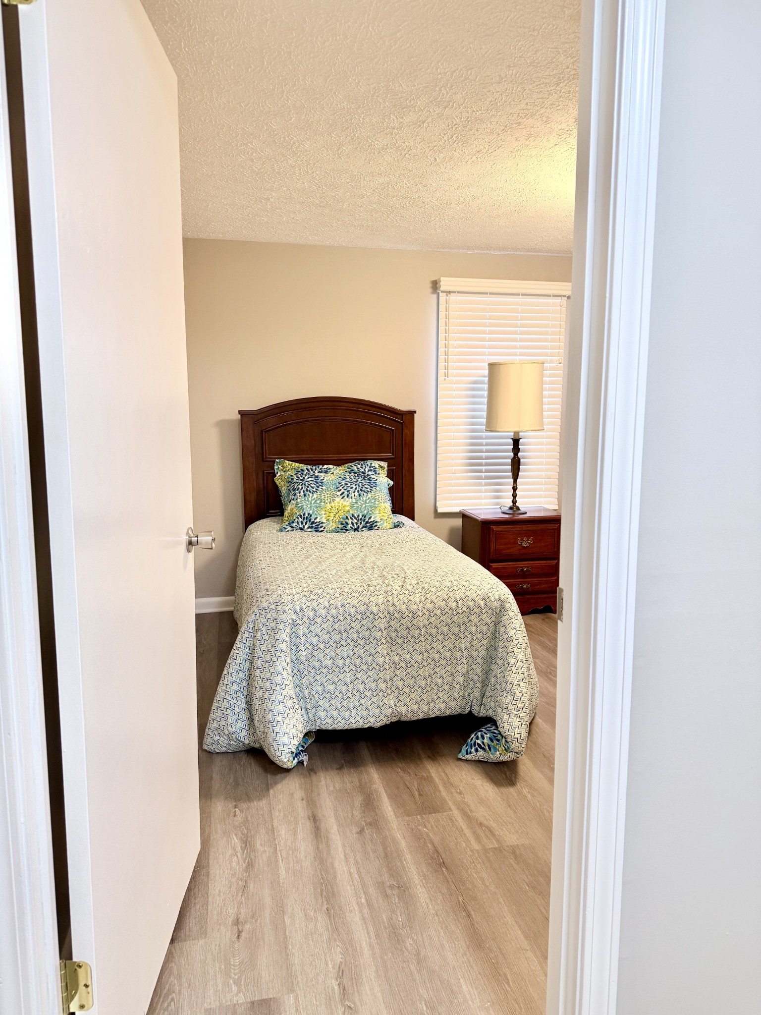 2210 Princeton Road Hopkinsville, KY 42240 - Photo 11 of 34 a bedroom with a bed and a mirror