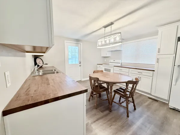 a view of a house with a street