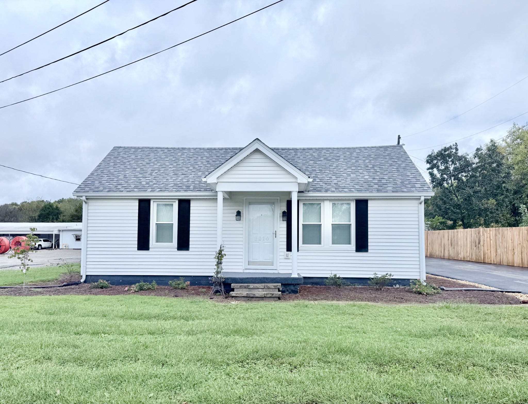 2210 Princeton Road Hopkinsville, KY 42240 - Photo 27 of 34 a front view of a house with yard