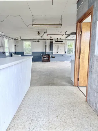 a view of a room with lots of of furniture