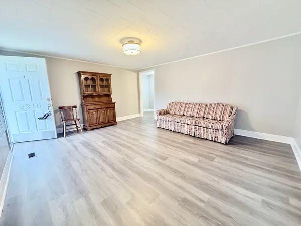 a view of livingroom with furniture and wooden floor