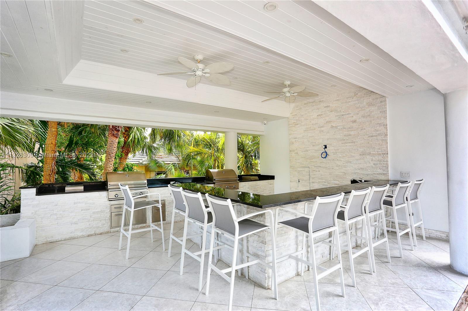 780 Northeast 69th Street, Unit 1004 Miami, FL 33138 - Photo 32 of 41 a view of a dining room with furniture window and outside view