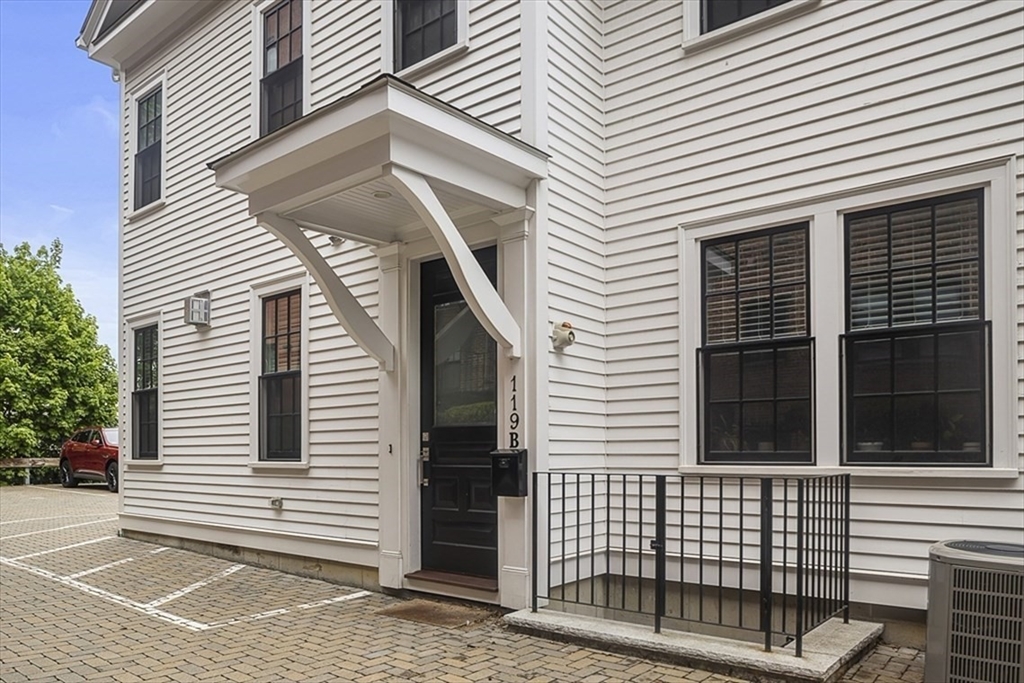 119 Highland Avenue, Unit B Somerville, MA 02143 - Photo 20 of 24 a view of a white house