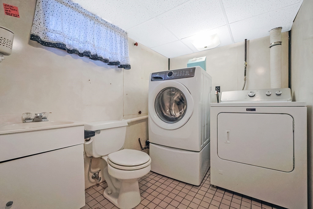 261 Adelaide Street Fall River, MA 02721 - Photo 24 of 28 a utility room with dryer and washer