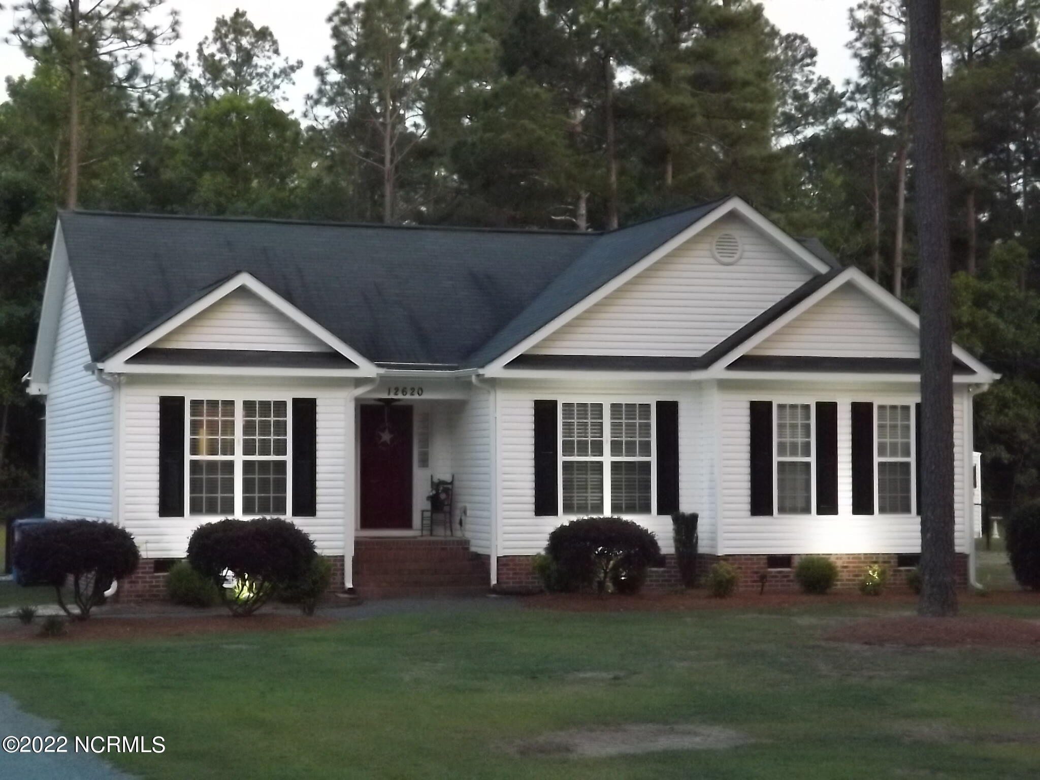 12620 Barnes Bridge Road Laurinburg, NC 28352 - Photo 53 of 53 Stunning at dusk with landscape lighting.