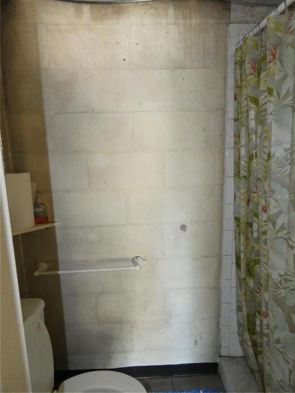 4392 Craftsbury Drive New Port Richey, FL 34652 - Photo 25 of 41 a bathroom with a shower