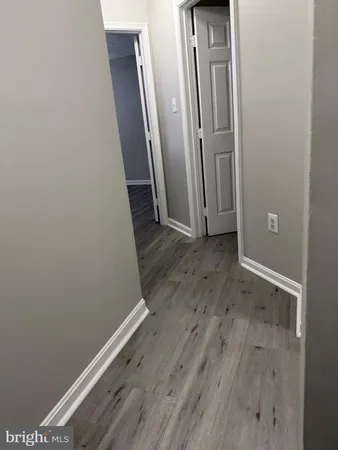 a view of a balcony with trees