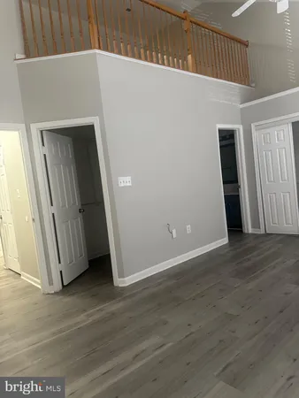 a bathroom with a toilet and a bathtub