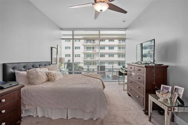 a bathroom with a double vanity sink mirror and toilet