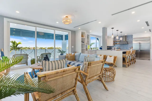 a bedroom with a large bed and a couch