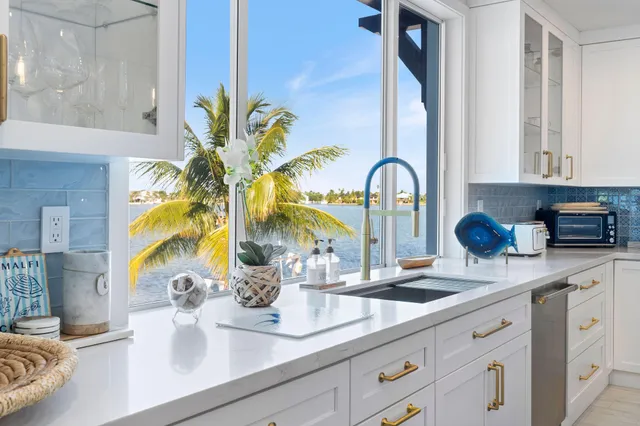 a bedroom with a bed and a mirror