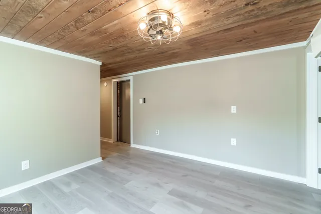 a bathroom with a shower and a toilet