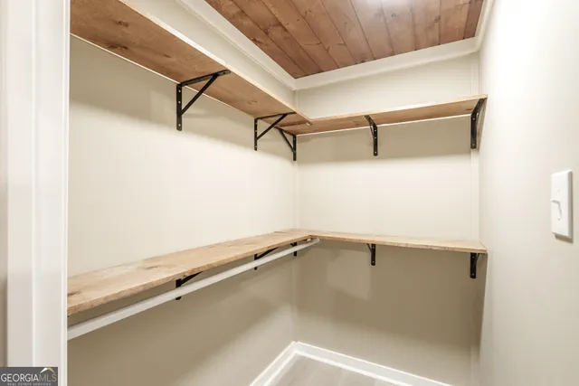 a kitchen with a refrigerator stove and a sink