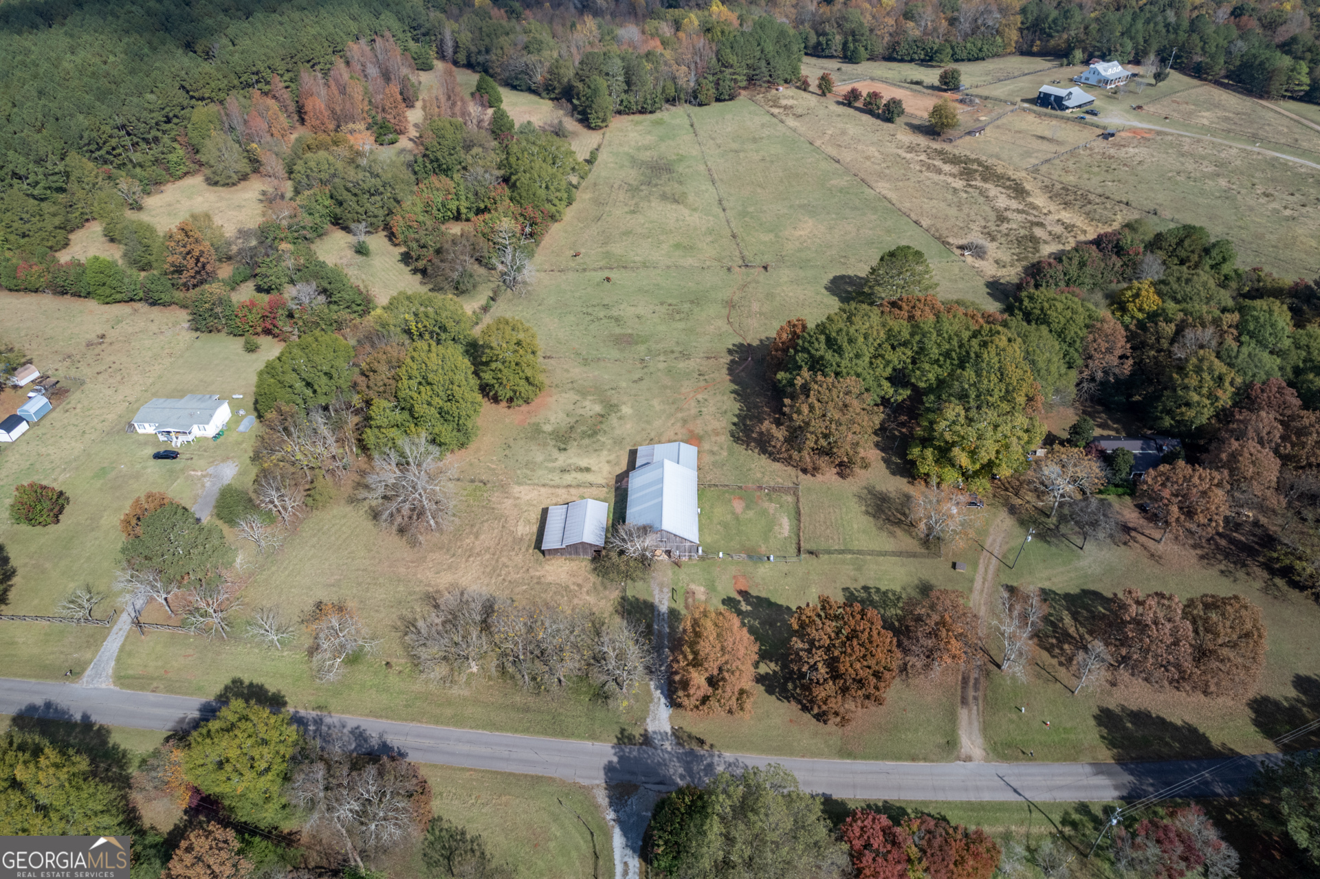 1121 Prospect Road, Unit A Madison, GA 30650 - Photo 34 of 34 an aerial view of a house with a yard
