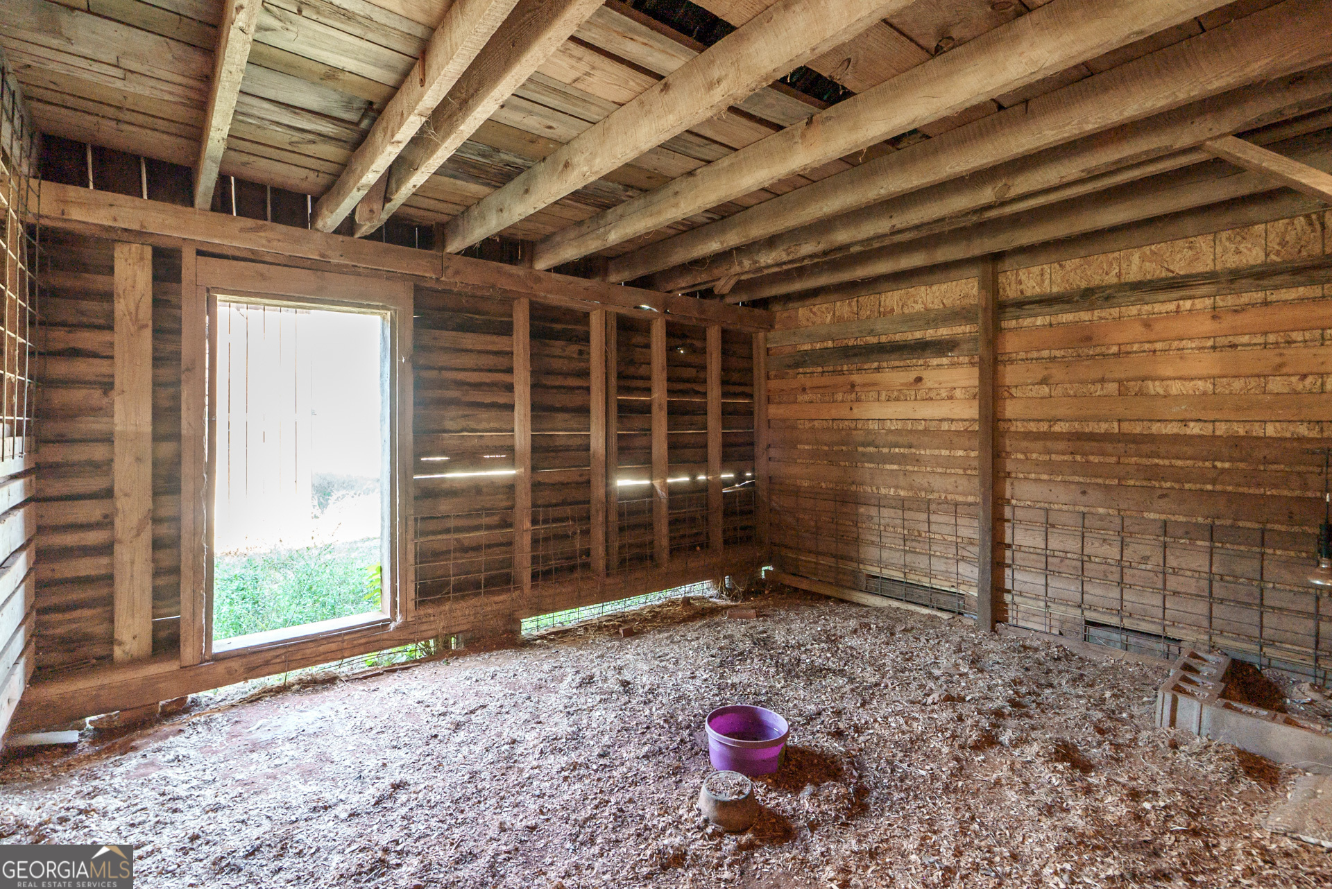 1121 Prospect Road, Unit A Madison, GA 30650 - Photo 8 of 34 a view of an empty room with a window