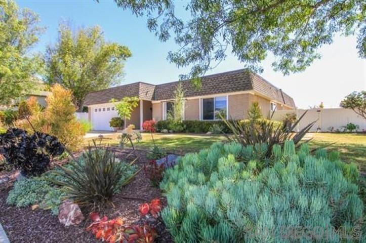 14747 Dash Way Poway, CA 92064 - Photo 3 of 23 a view of a house with a yard and plants