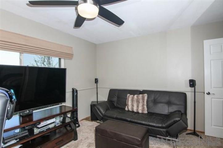 14747 Dash Way Poway, CA 92064 - Photo 21 of 23 a living room with furniture and a flat screen tv