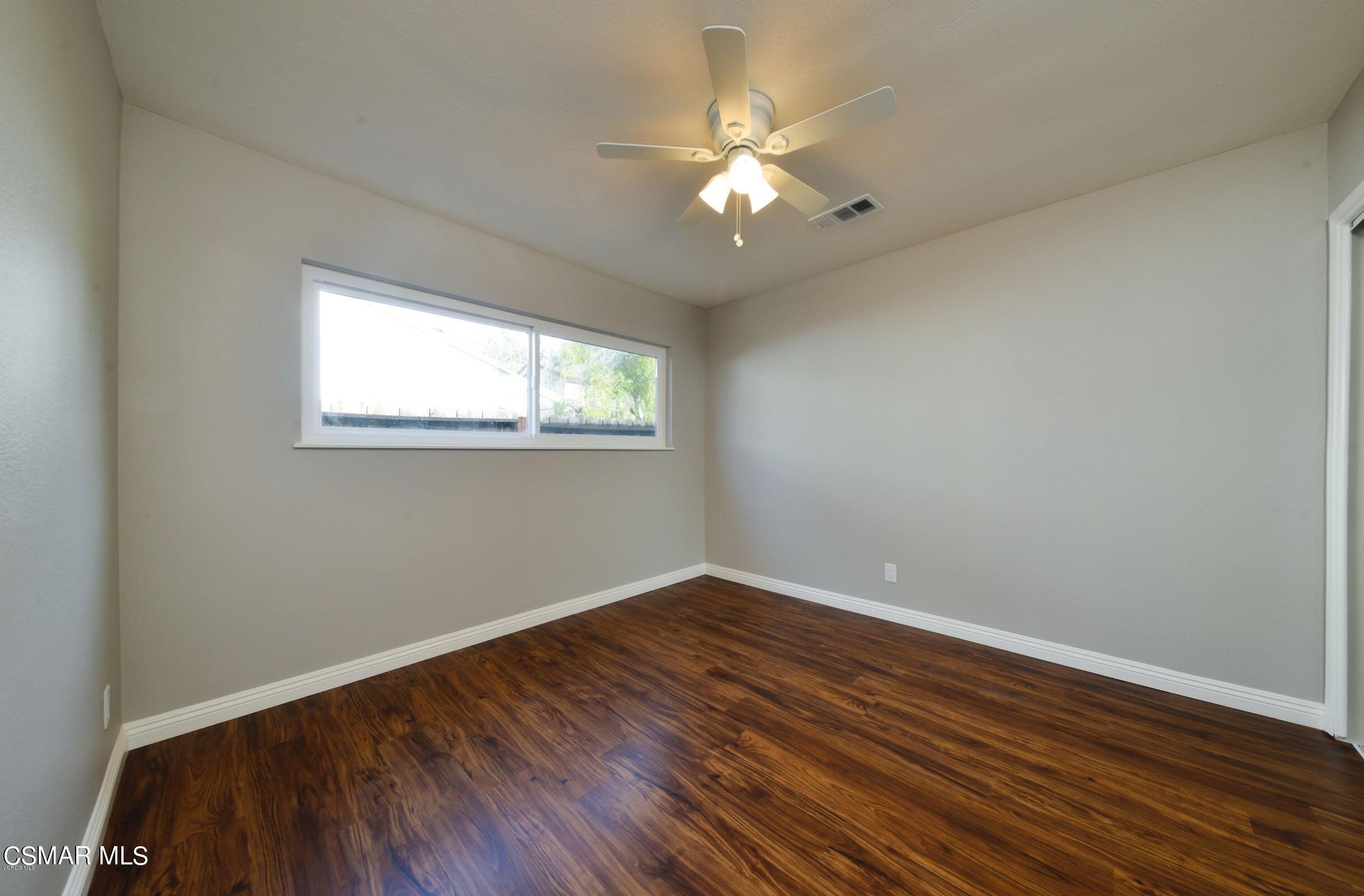2769 Los Robles Road Thousand Oaks, CA 91362 - Photo 11 of 15 a view of empty room with wooden floor and fan