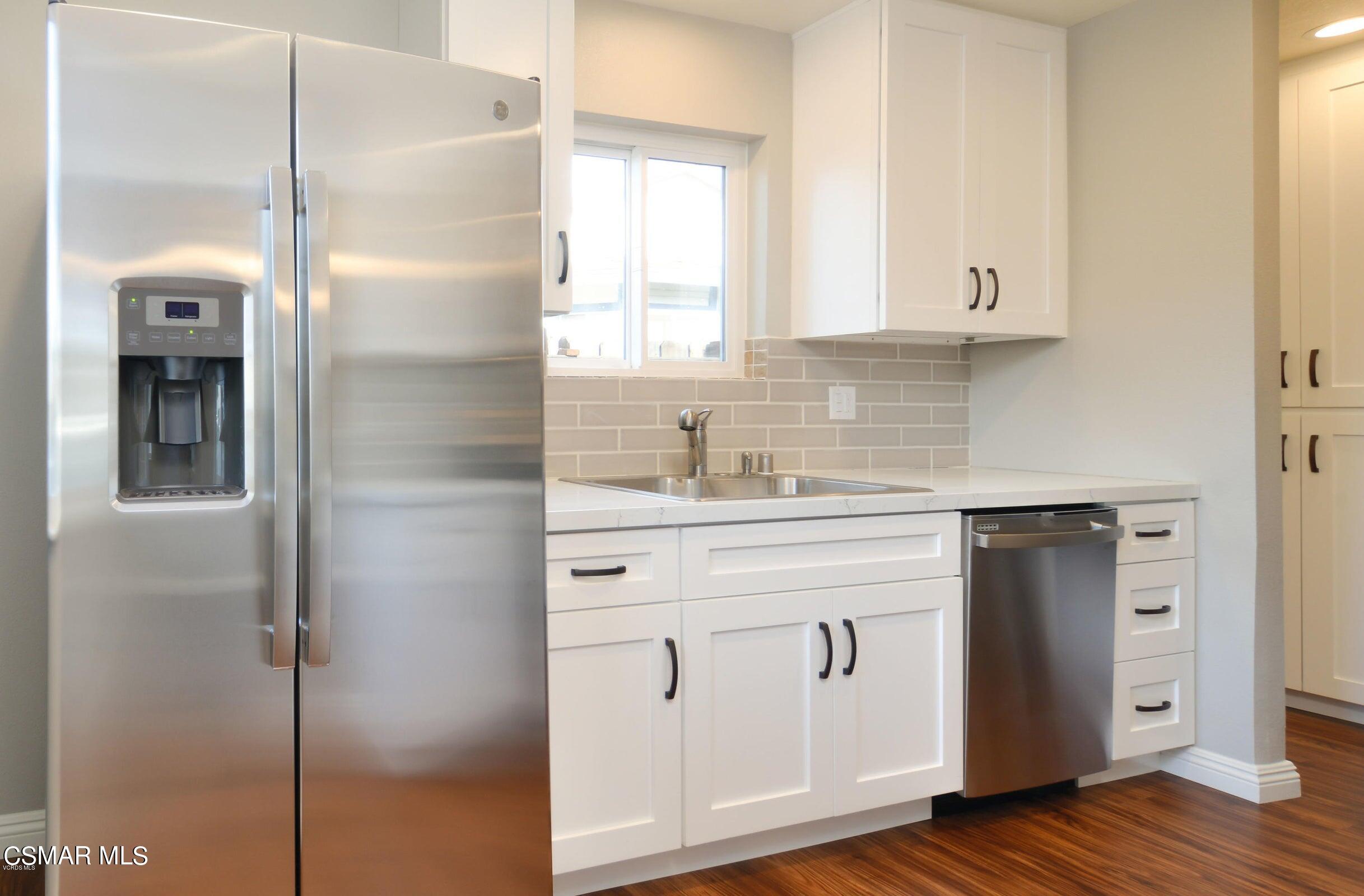 2769 Los Robles Road Thousand Oaks, CA 91362 - Photo 4 of 15 a kitchen with white cabinets and sink