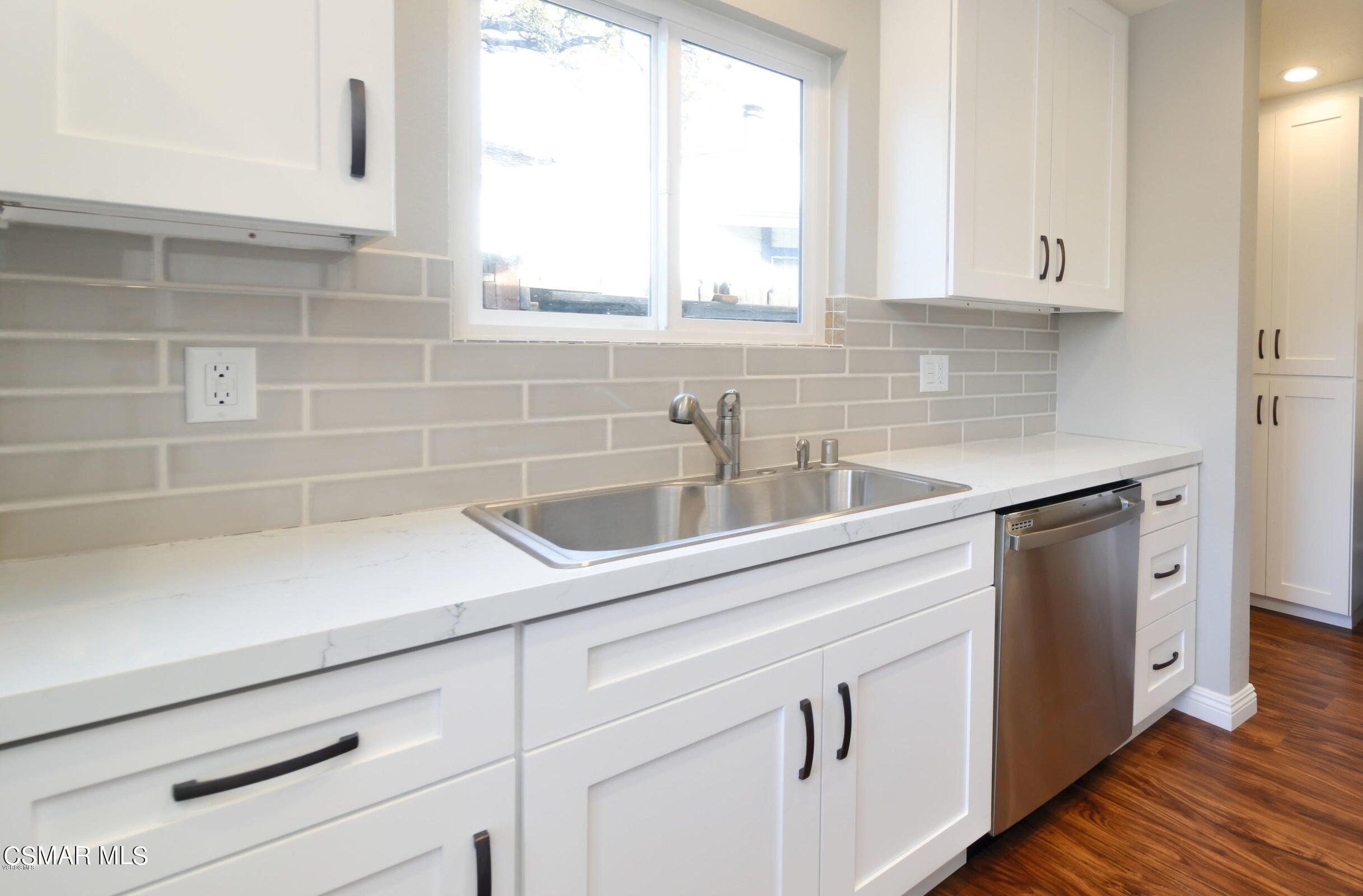 2769 Los Robles Road Thousand Oaks, CA 91362 - Photo 5 of 15 a kitchen with a sink and cabinets