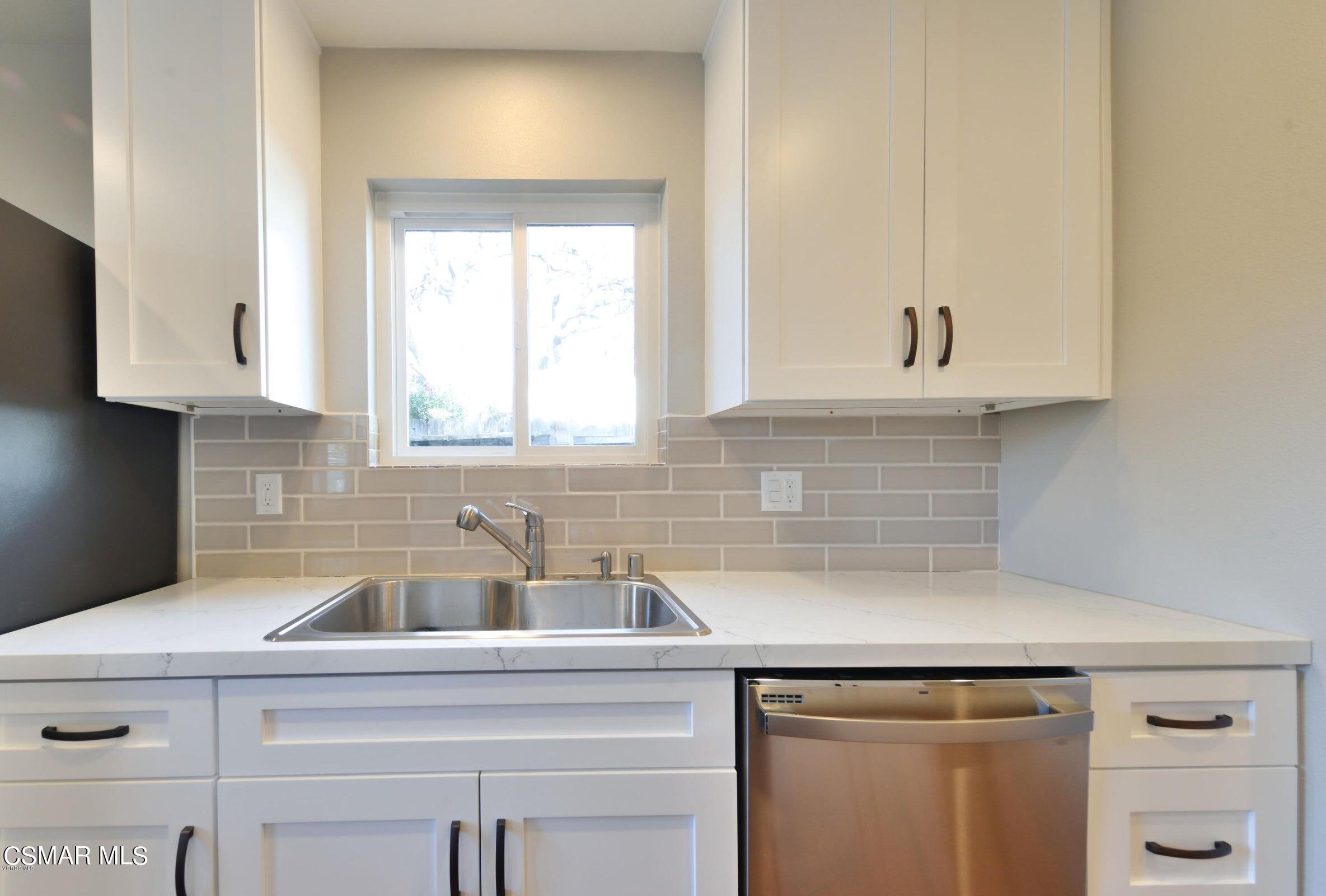 2769 Los Robles Road Thousand Oaks, CA 91362 - Photo 7 of 15 a kitchen with a sink cabinets and a window