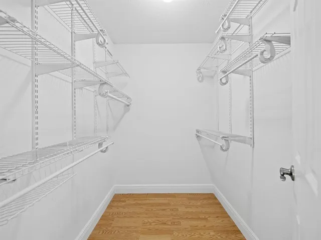 a view of a room with racks on the wall