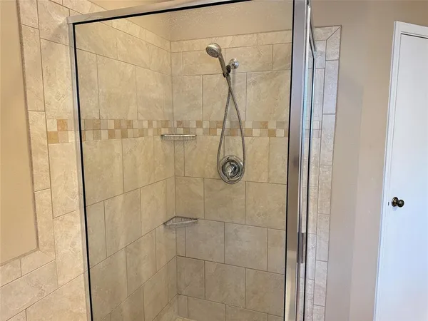 a kitchen with a sink cabinets and a window