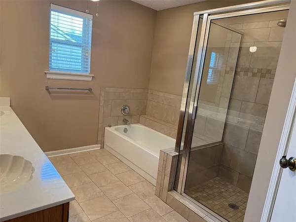 a kitchen with stainless steel appliances a refrigerator and a sink