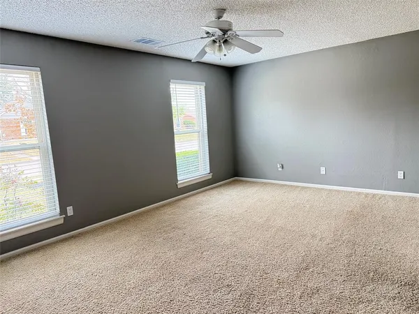 a bathroom with a tub and a shower