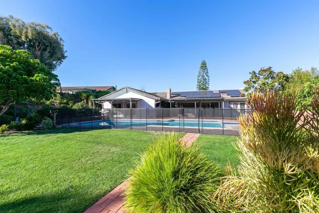 a house view with a garden space