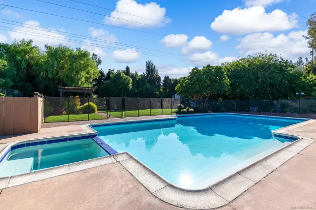 a view of an outdoor space and swimming pool