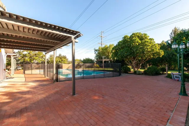 a view of a backyard of the house