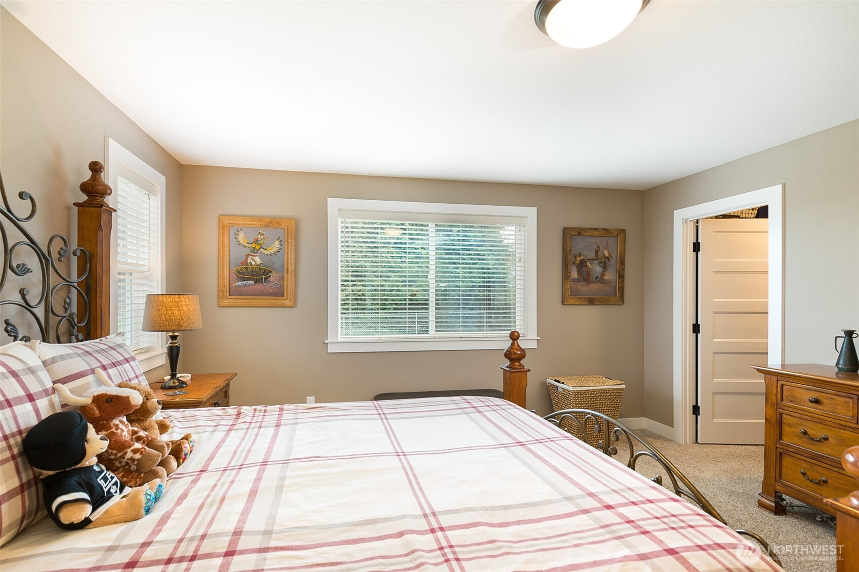 41 Victoria View Street Sequim, WA 98382 - Photo 13 of 40 a bedroom with a bed and wooden floor