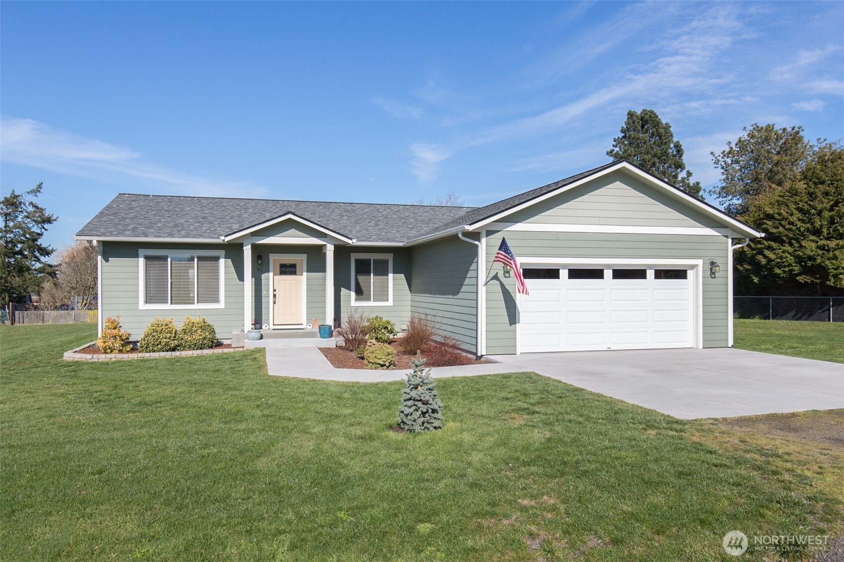 41 Victoria View Street Sequim, WA 98382 - Photo 22 of 40 a front view of a house with a yard and garage