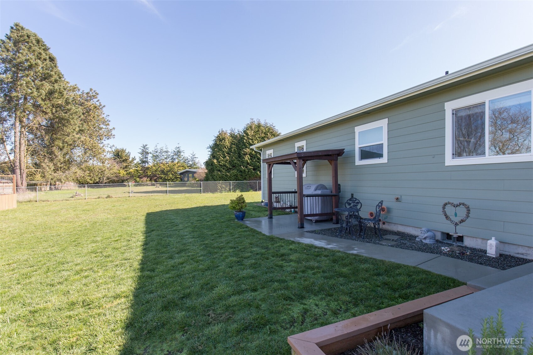 41 Victoria View Street Sequim, WA 98382 - Photo 26 of 40 a view of a house with yard and sitting area