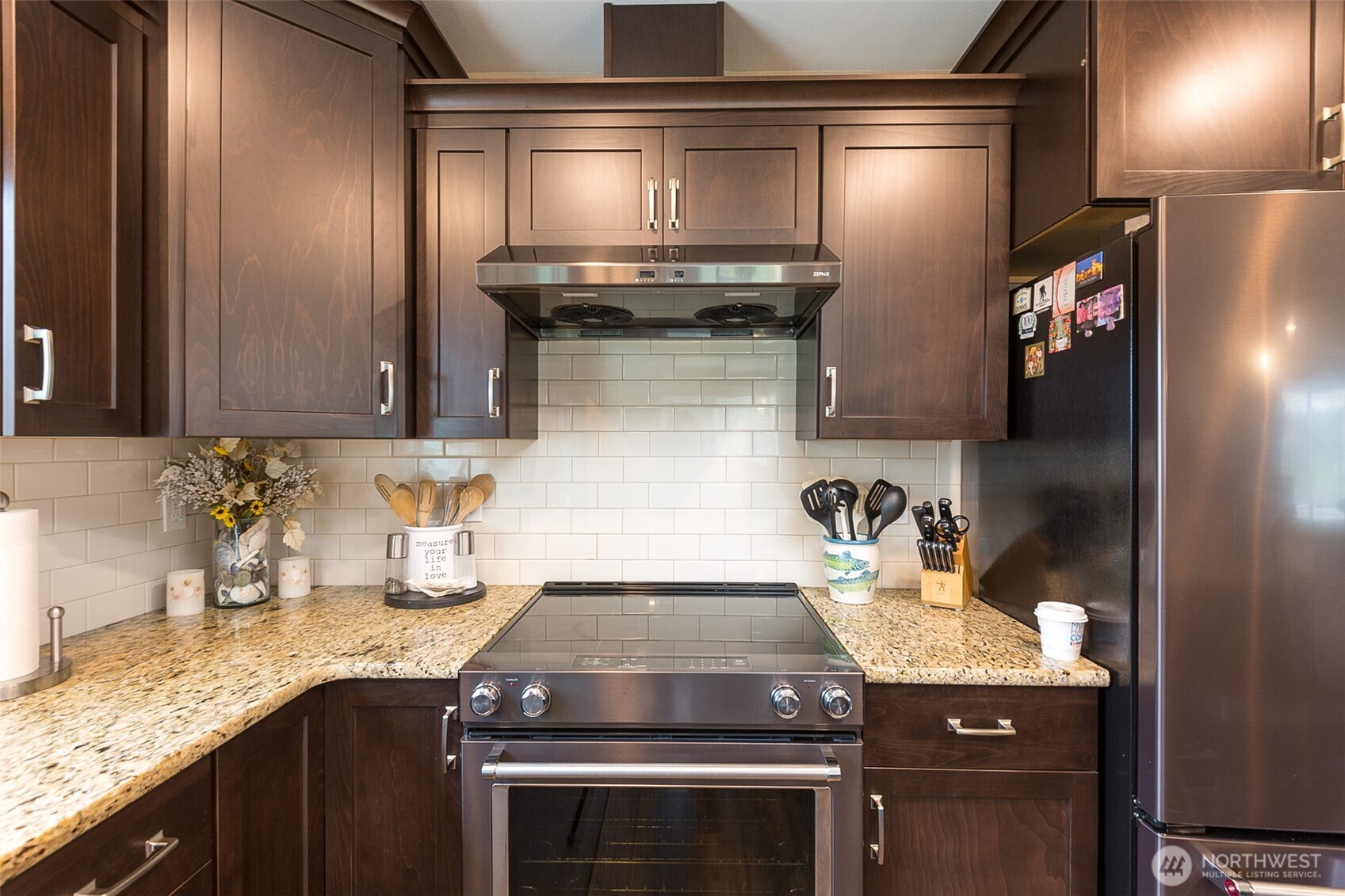 41 Victoria View Street Sequim, WA 98382 - Photo 8 of 40 a kitchen with granite countertop a sink stainless steel appliances and cabinets