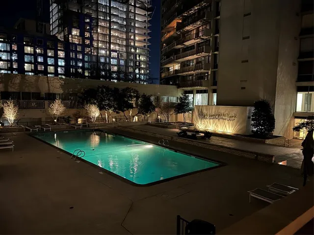 a view of swimming pool with a yard
