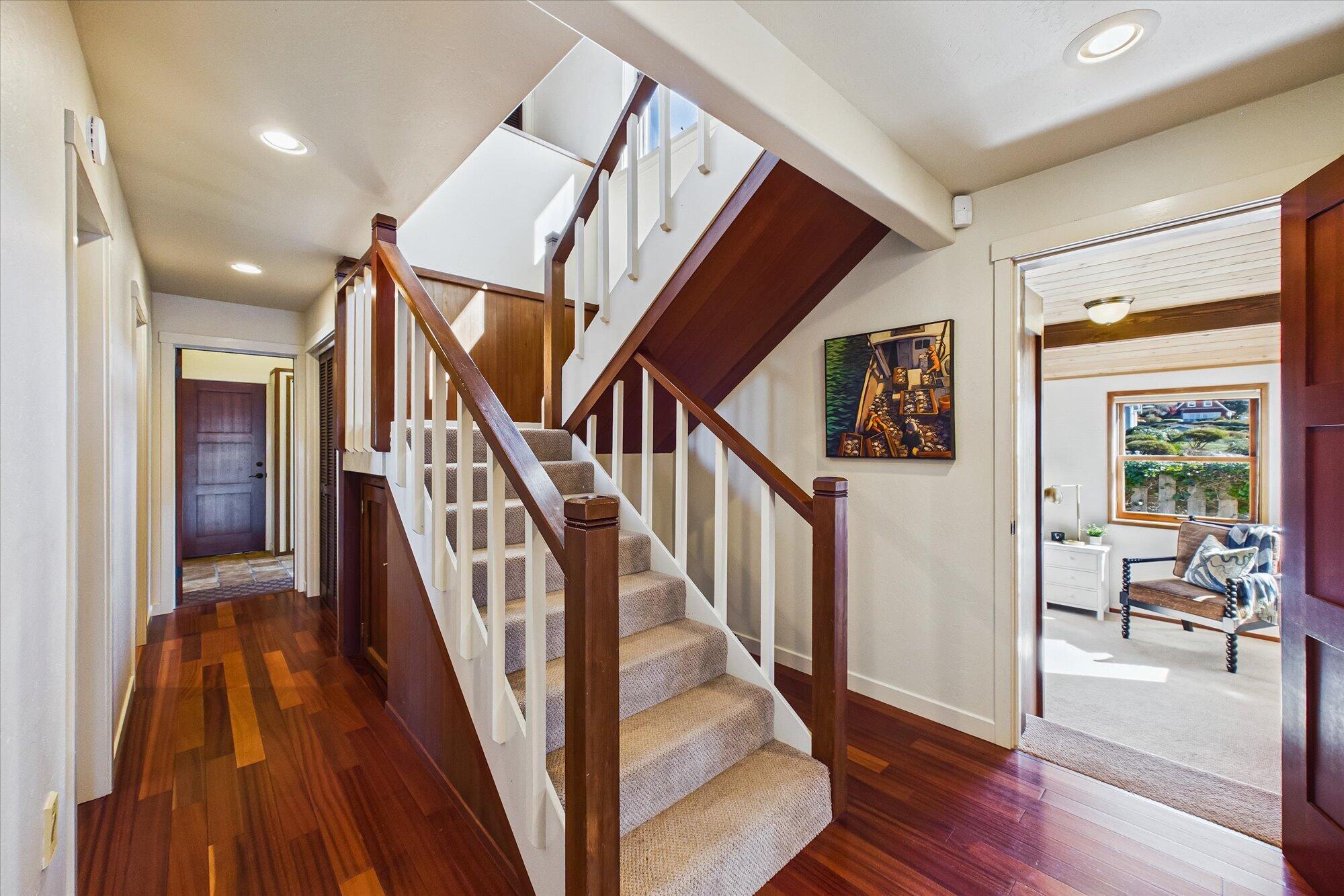 730 Edwards Street Trinidad, CA 95570 - Photo 27 of 73 Stairs to second floor, and doorway to 2nd master suiter on 1st floor