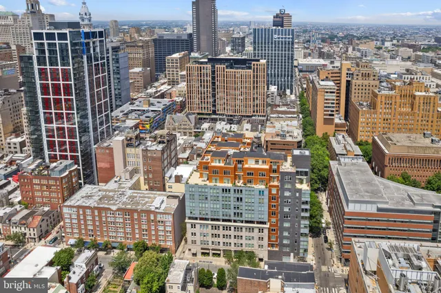 a view of city with tall buildings