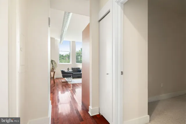 a view of living room with wooden floor