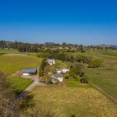 a view of an ocean with a mountain