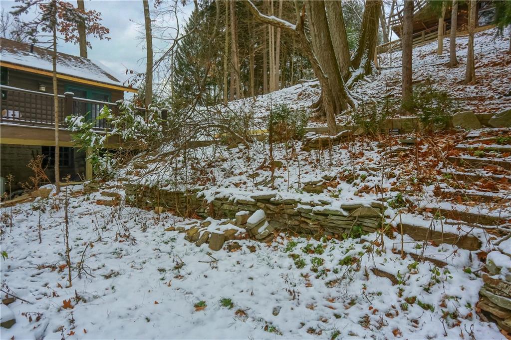 3210 Evergreen Road Pittsburgh, PA 15237 - Photo 12 of 47 a backyard of a house with large trees
