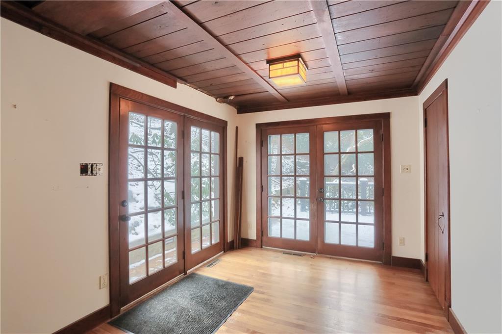3210 Evergreen Road Pittsburgh, PA 15237 - Photo 16 of 47 a view of an empty room with wooden floor and a window