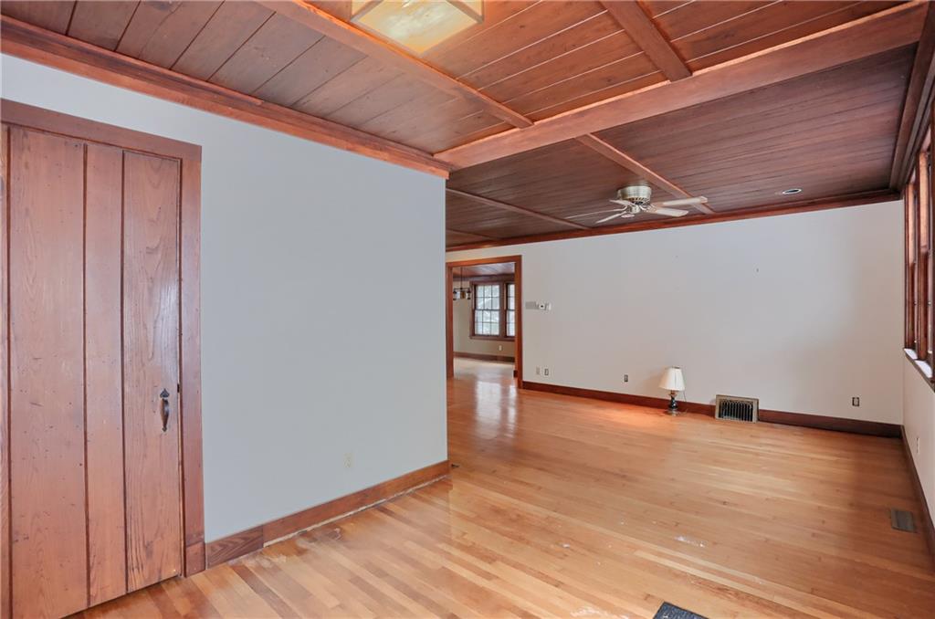 3210 Evergreen Road Pittsburgh, PA 15237 - Photo 17 of 47 a view of an empty room with wooden floor