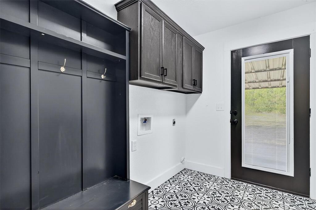 621 Craft Road Bells, TX 75414 - Photo 16 of 40 a view of a closet area with wooden floor