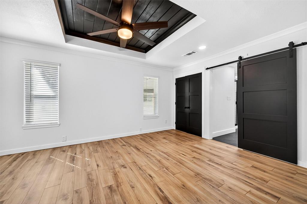 621 Craft Road Bells, TX 75414 - Photo 18 of 40 a view of an empty room with wooden floor