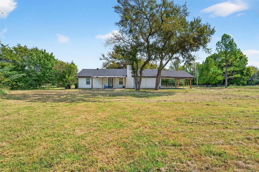 621 Craft Road Bells, TX 75414 - Photo 30 of 40 a house with swimming pool in front of it